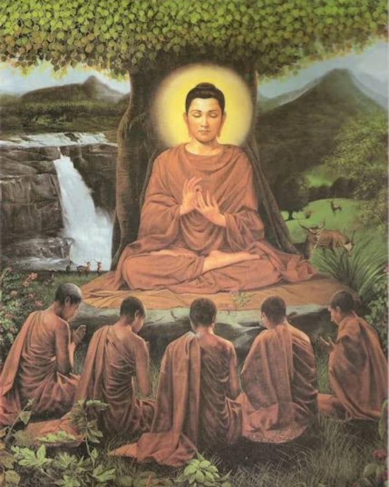 Lord Buddha turning the first Wheel of Dharma